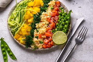 Healthy bowl with salmon and vegetables