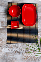 Accessories for sushi on a wooden table. Close up. Selective focus