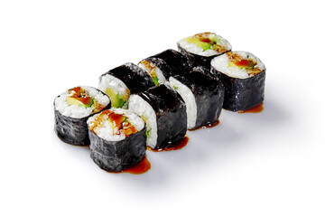 Delicious sushi rolls with eel, avocado, and unagi sauce drizzled on white background
