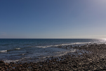 Faro de Maspalomas Spain seascape, beach and lighthouse Faro and sand dunes in Gran Canaria