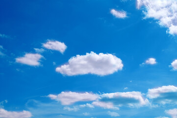 Bright sunny day, blue sky with white clouds