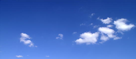 Bright sunny day, blue sky with white clouds