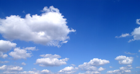 Bright sunny day, blue sky with white clouds