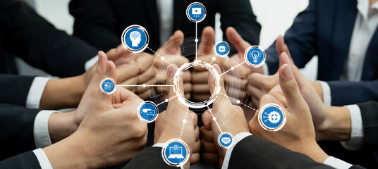 A business team showing thumbs up in a collaborative effort symbolizing support for innovation,...