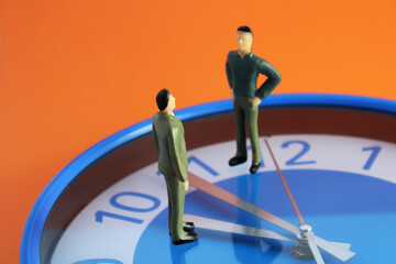 Clock marks the time of two executives' meeting