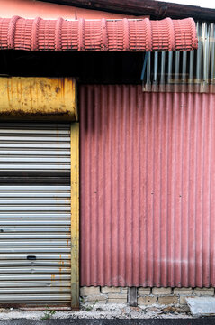 Corrugated metal and old shutter door