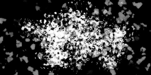 Snowflakes on dark background. white icy snowflakes isolated on black background, natural background. white crystalline powder on a black background. sugar dust. texture, pattern and clipping.