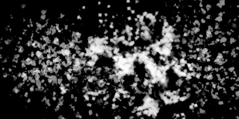 Snowflakes on dark background. white icy snowflakes isolated on black background, natural background. white crystalline powder on a black background. sugar dust. texture, pattern and clipping.