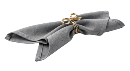 Gray napkin tied with golden ring isolated for table decor  