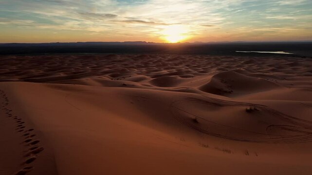 Merzouga, Morocco: Panoramic view of the sunset over the Merzouga from the Erg Chebbi sand dunes in the the Sahara desert in Morocco