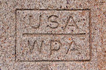 “WPA” Works Progress Administration stamp on sidewalk was active in Bisbee, Arizona in 1935