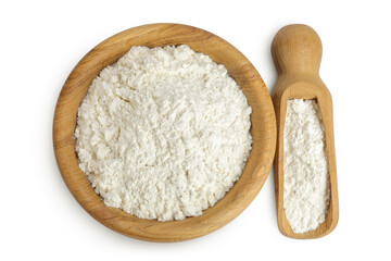 White flour in wooden bowl and scoop isolated on white background. Top view. Flat lay.