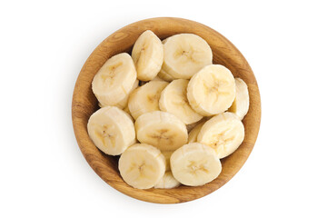 peeled banana pieces in wooden bowl isolated on white background. Top view. Flat lay.