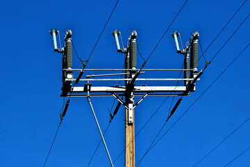 Three Jumper cables with cutoff switches on three phase electrical line.  Placing cutout fuses on...