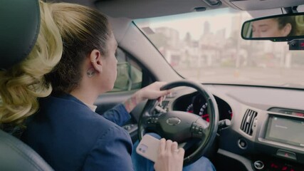 Transwoman distracted driving while using a mobile device stops his vehicle suddenly to avoid an accident. 
