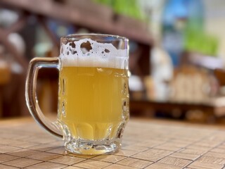 Enjoying Chilled Beer in a Charming Rustic Setting Surrounded by Bubbles and Friends. A refreshing...