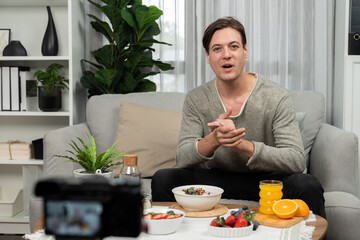 Smart nutrition broadcaster presenting healthy food choice in life of fresh yogurt toppings with...