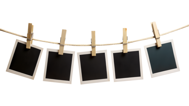 blank photo frames on rope isolated on transparent white background, clipping path