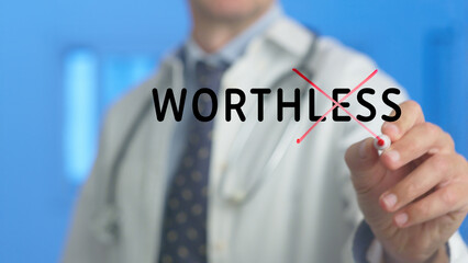 Doctor is crossing out the word worthless written on a virtual screen using a red marker, symbolizing overcoming feelings of inadequacy and promoting self worth
