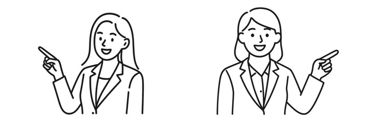 Two businesswomen pointing and smiling while discussing ideas in a collaborative environment