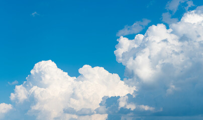 Beautiful view of blue sky with clouds at sunrise. Sky clouds background. Partly cloudy. Background...