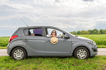 Driving car trip. Family road vehicle. Summer countryside stop adventure.