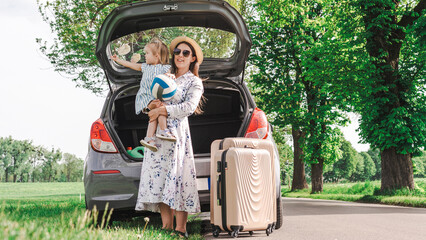 Travel family. Road trip summer fun. Parents daughter suitcase nature.