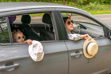 Travel car. Family trip countryside vehicle. Parents daughter outdoor road summer.
