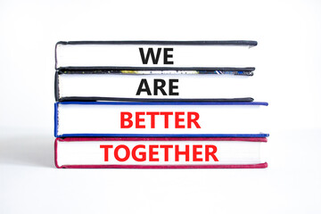 We are better together symbol. Concept words phrase We are better together on beautiful books. Beautiful white paper background. Business We are better together concept. Copy space.