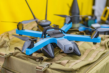 Image of Ukrainian fpv drones on a camouflage pack Varied designs, sizes, finishes matte, glossy,...