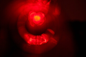 Abstract light leaks on dark background for design and special effects. Random shapes.