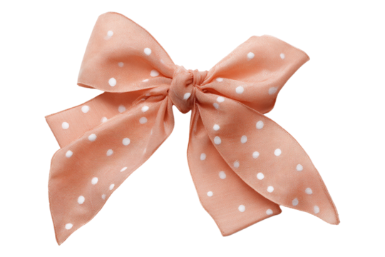 Peach polka dot bow isolated on transparent background