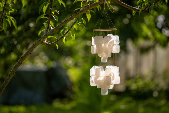 Garden chime made of capiz shells