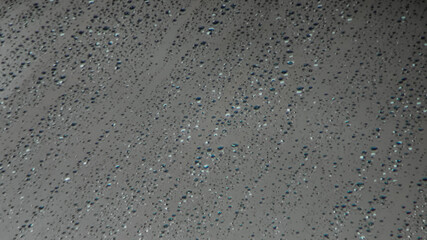 Rain-Kissed Surface: Abstract Texture of Water Droplets on Gray