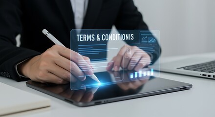 Fototapeta premium Person digitally signing Terms and Conditions on tablet