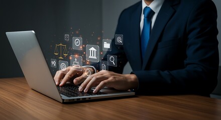 Person in Dark Suit Using Laptop with Law Icons computer