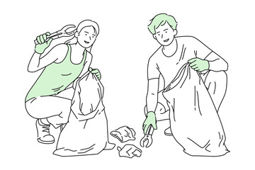 Two young volunteers are cleaning the beach, they are collecting plastic waste with gloves and trash picker