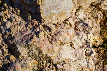 Surface of dense fine-grained limestone, geological outcrop of sedimentary rock