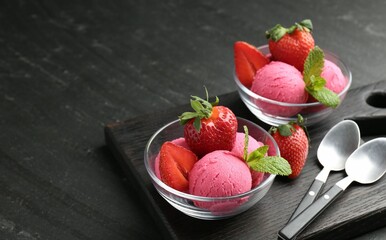 Refreshing sorbet, strawberries, mint and spoons on grey textured table, closeup. Space for text