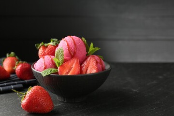 Refreshing sorbet with syrup, strawberries and mint in bowl on grey textured table, closeup
