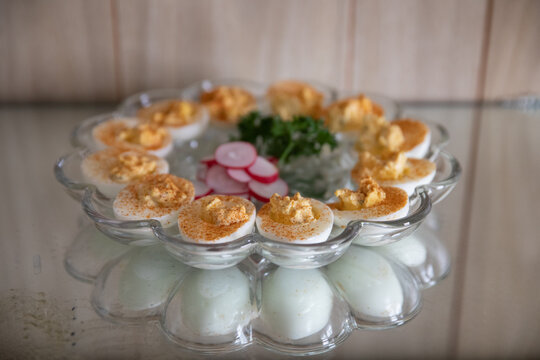 deviled eggs on mirrored table
