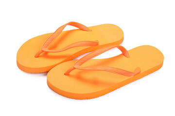 Stylish orange flip flops isolated on white. Beach accessory