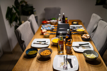 Dining Table prepared for Raclette Meal with Friends