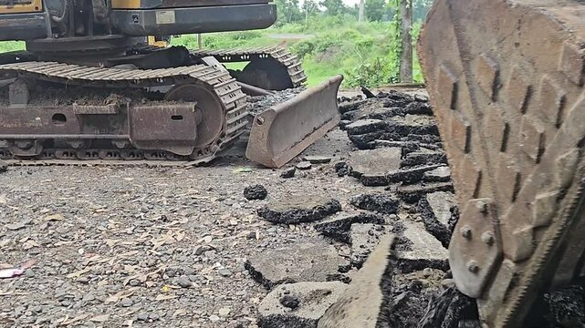 Busy construction site India. Heavy equipment and industrial machinery like bulldozer, compactor, pavers work on road and highway development, complete street maintenance for urban infrastructure