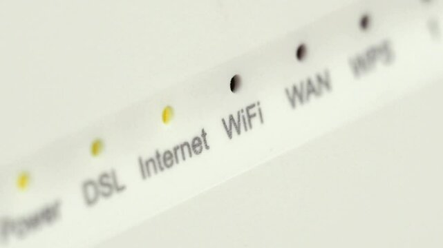 Close-up of Wireless Router Indicators, DSL, Internet, WiFi, WAN Lights