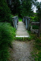 Wood and tell Bridges over the Mitternacher Ohe River in the bavarian Forests Germany.