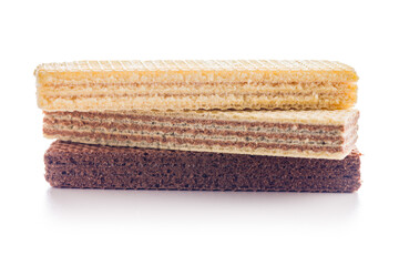 Sweet wafers filled with chocolate and vanilla cream isolated on white background.