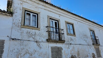 Old House Facade with Balconies and Peeling Paint – Abandoned Vintage Building