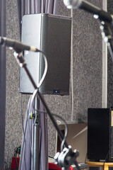 Sound system setup in a rehearsal space during music practice session