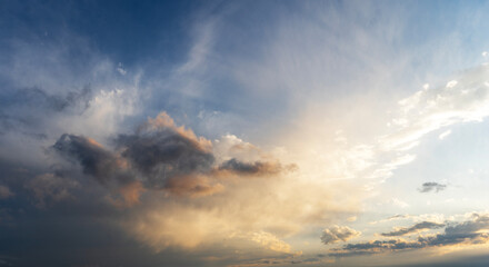 Beautiful sunset sky, with clouds, after rain. Evening sky background.